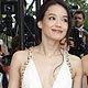 Jury members Italian actress Asia Argento and Taiwanese actress Shu Qi arrive on the red carpet for the screening of the film `Inglourious Basterds` at the 62nd Cannes Film Festival